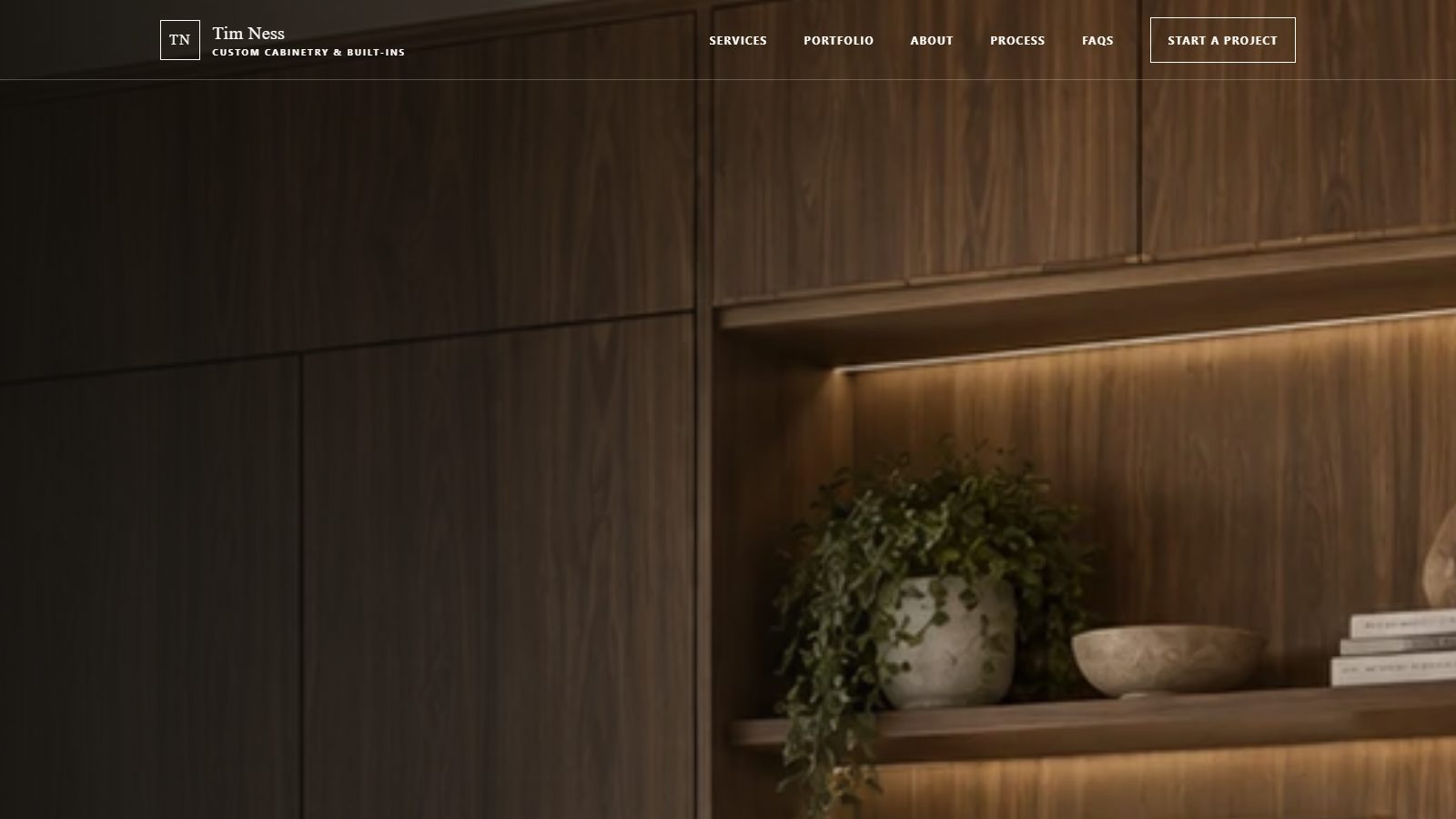 Tim Ness carpentry website homepage showing the project portfolio and service structure